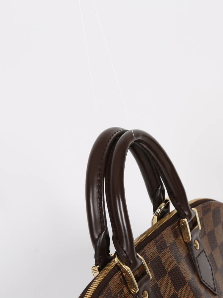 Louis Vuitton Alma PM Damier Ebene Canvas www.luxurybags