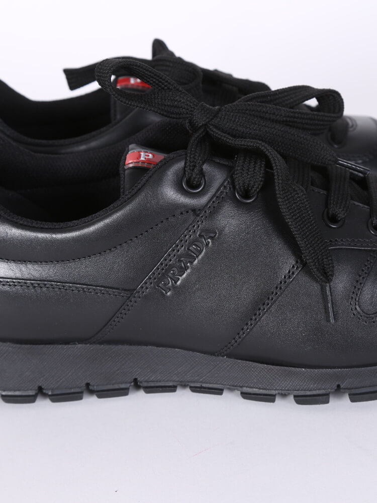 Prada vitello plume leather sneakers online