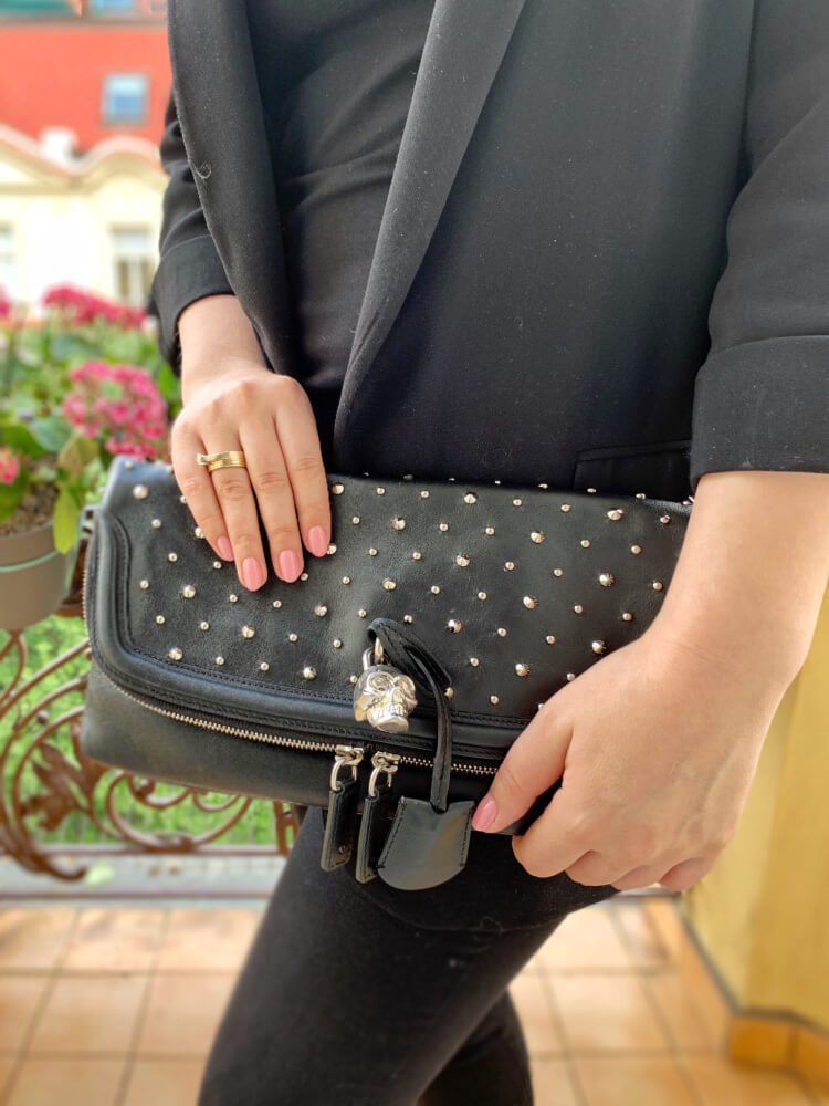 Black studded clutch top