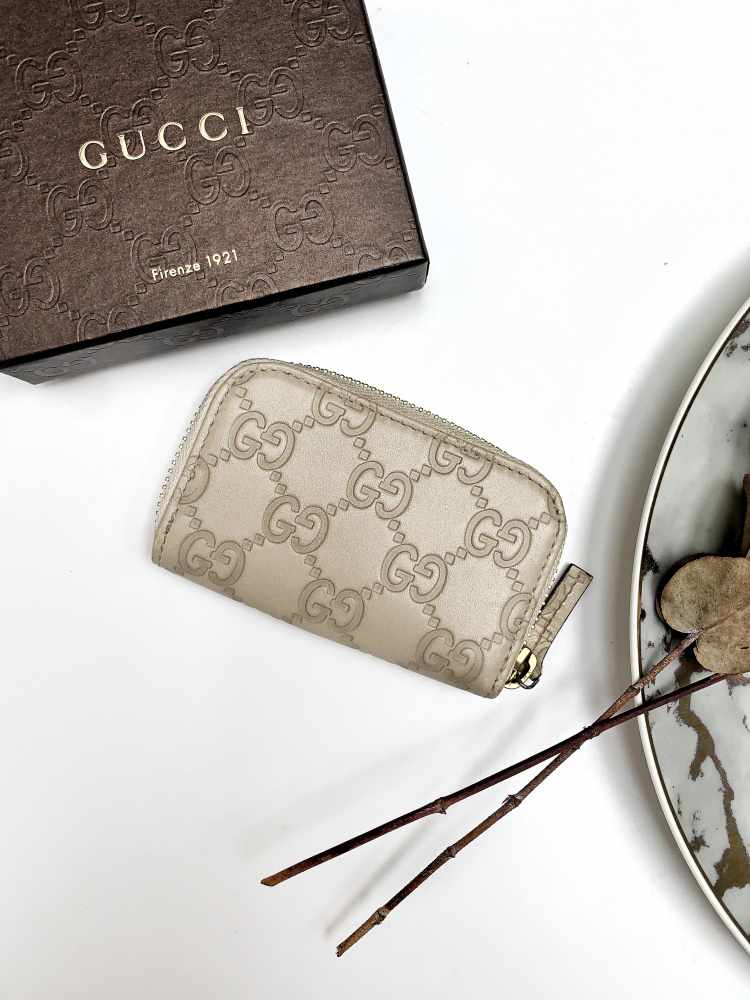 Gucci Guccissima Leather Zippy Coin Purse Ivory www.luxurybags