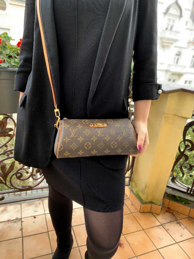 Eva cloth clutch bag Louis Vuitton Brown in Cloth - 29517344