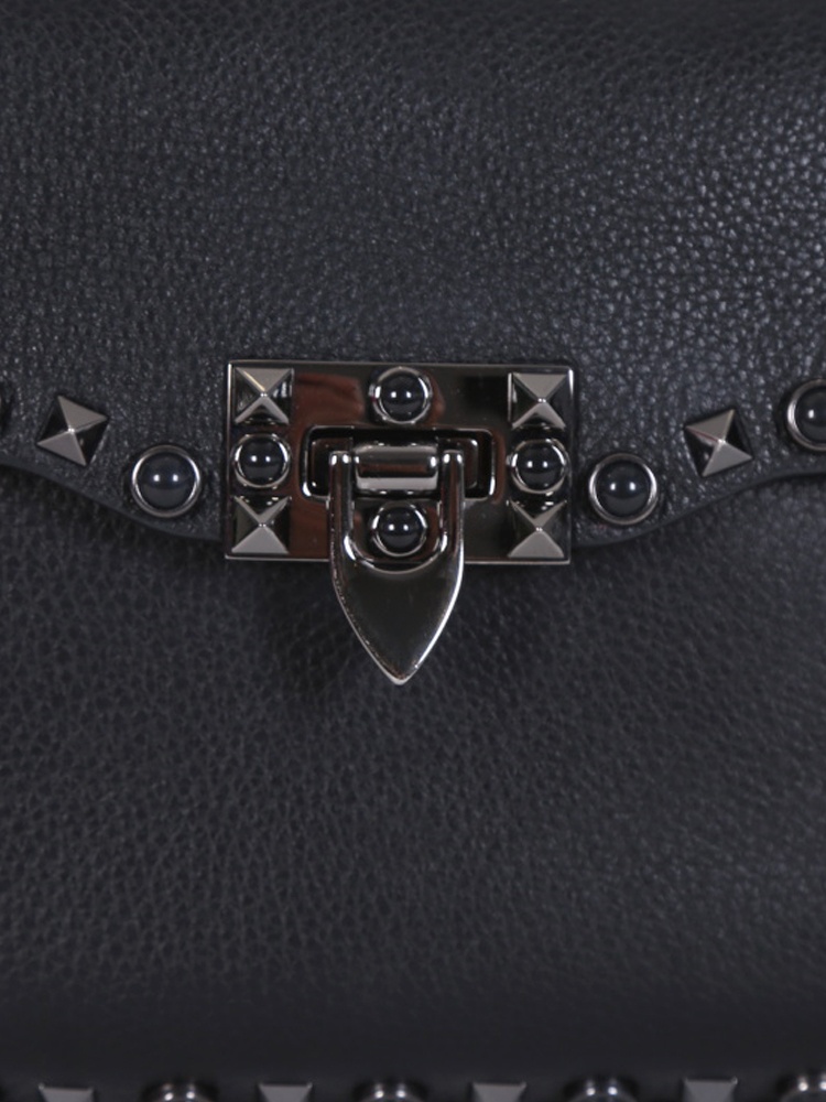 Rockstud rolling crossbody discount bag
